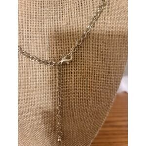 Silver tone necklace with pendant